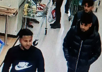 Police are keen to trace these people after a robbery at Tesco in New Milton. Picture: Hampshire Police