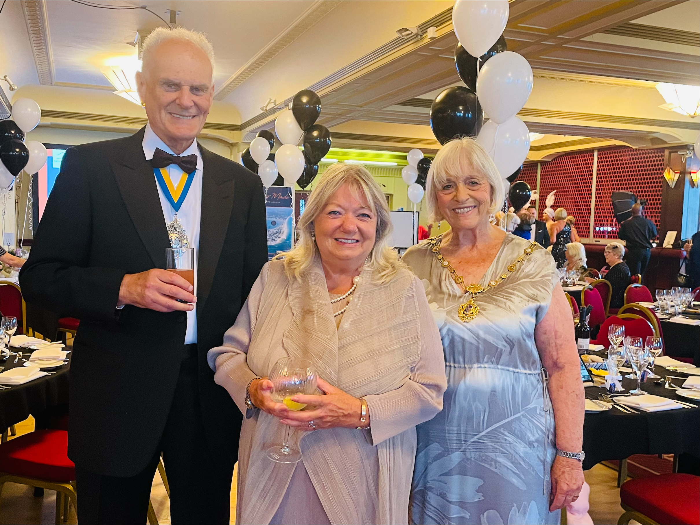 DCCF trustee, Di Bird (centre) at the charity's Black Tie Dinner 2022.