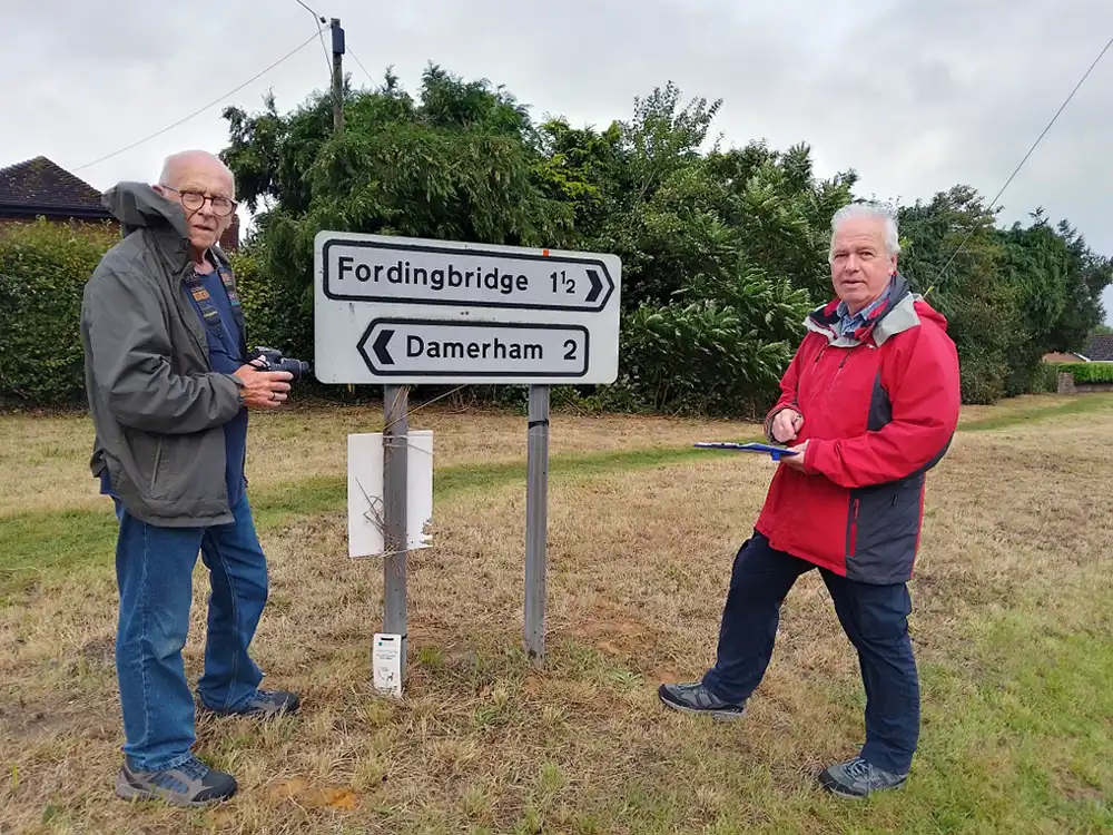 STA team members Nigel Kendall and Simon Freeman record village signage