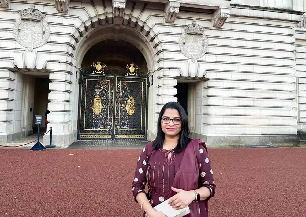 Deepa Pappu, equality, diversity, and inclusion lead at University Hospitals Dorset (UHD), at Buckingham Palace