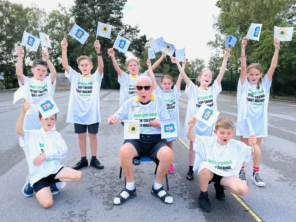 Eric Cole with youngsters who took part in his campaign