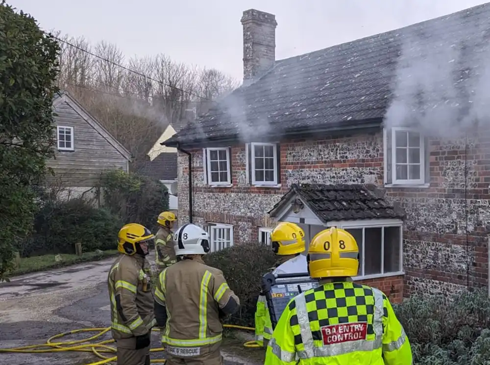 The couple were rescued from a house in Cheselbourne by fire crews this morning. Picture: DWFRS