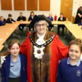 Mayor of Verwood, Cllr Toni Coombs, with Jasper Nash, chair of the school parliament, right, and Sienna Mills, deputy prime minister