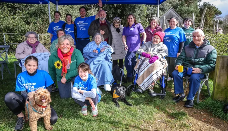 Care South staff and residents with the Lewis-Manning Hospice Care team at the Muddy Dog Dash
