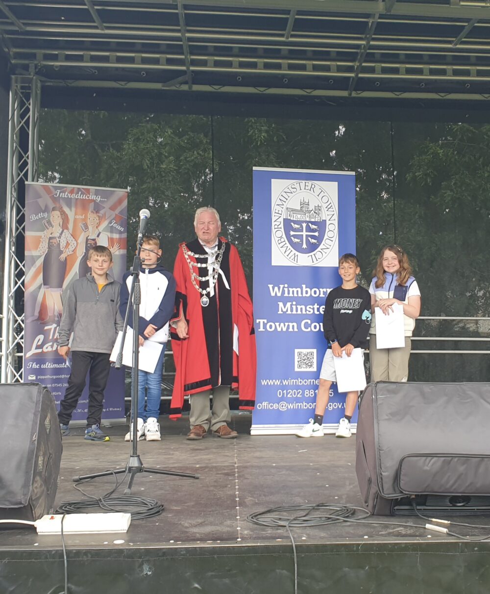 The four winners of the poetry competition on stage at Willow Walk Picture: Wimborne Minster Town Council
