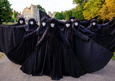 Campaigners dressed as oil slicks posed outside Windsor Castle Picture: Wimborne XR