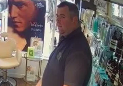 Police are keen to trace this person after thefts from Perfumery & Co in Lymington High Street. Picture: Hampshire Police