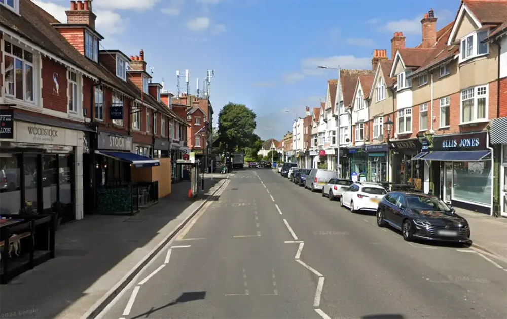 The woman was hurt as she helped her child out of the car in Western Road, Poole. Picture: Google