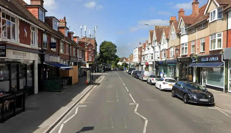 The woman was hurt as she helped her child out of the car in Western Road, Poole. Picture: Google