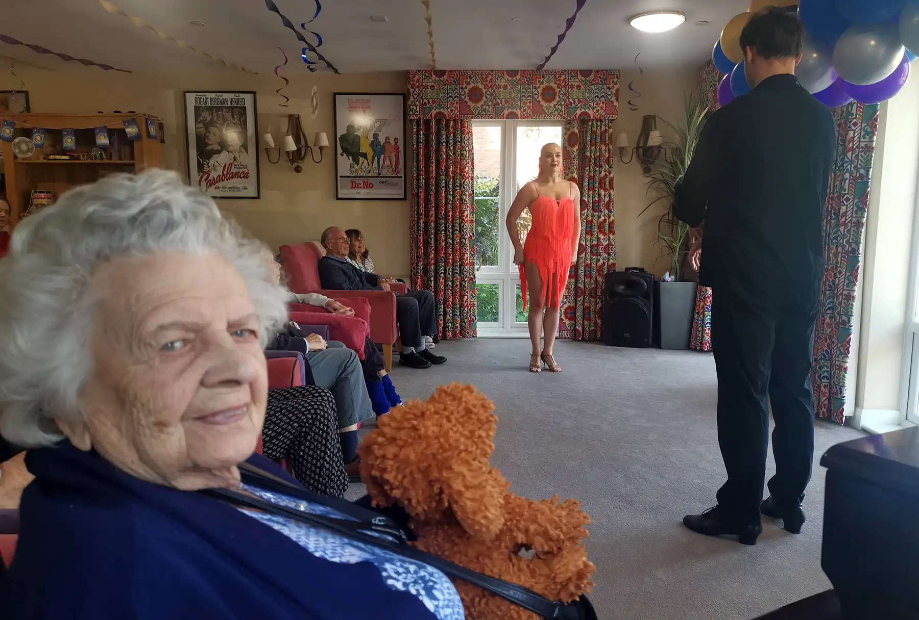102-year-old former dancer Margaret Honeyman watches the performance at Linden House by Kamil Kuroczko and Caitlin Heasman