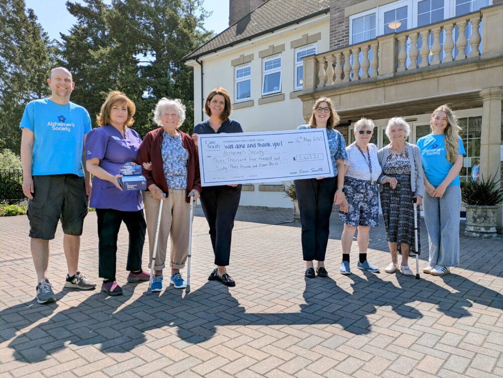 St Ives House residents and team present more than £3,400 to Alzheimer's Society Picture: Care South