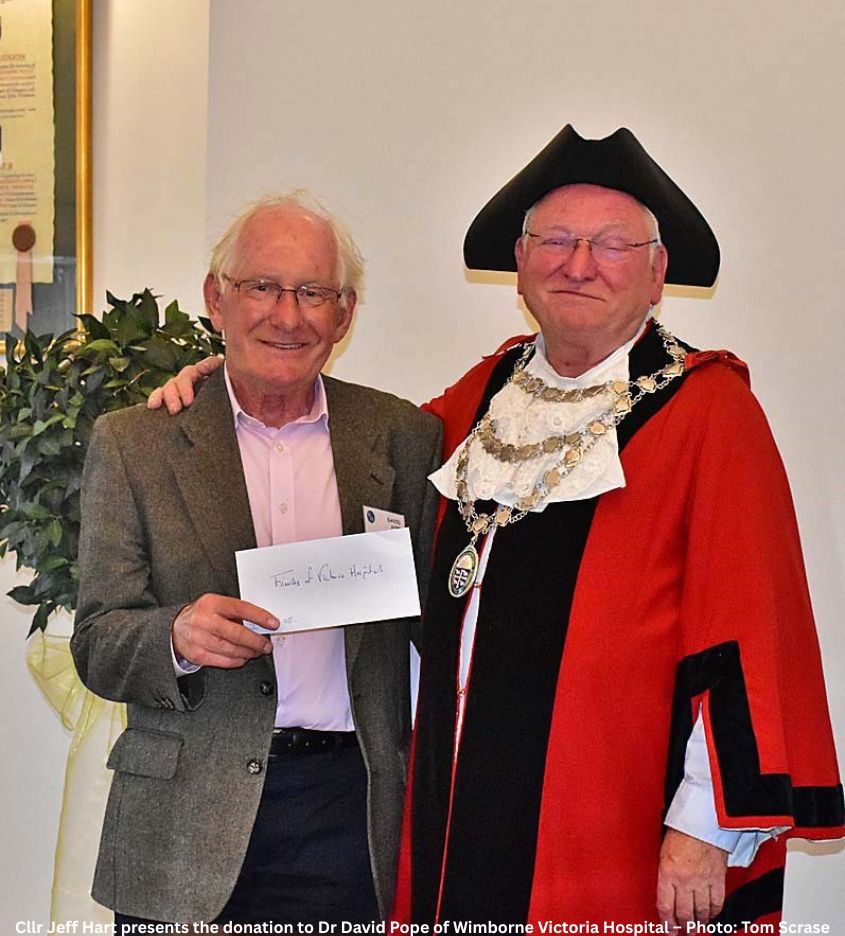 Dr David Pope of Friends of Victoria Hospital being handed the cheque by cllr Jeff Hart Picture: Tom Scrase