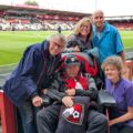 Maurice with wife, Marian, and the Talbot View team at the Vitality Stadium Picture: Care South