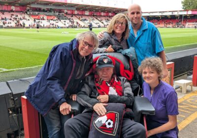 Maurice with wife, Marian, and the Talbot View team at the Vitality Stadium Picture: Care South