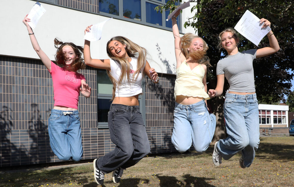 Katie Gazzard, Olivia Breckon, Lois Robinson, Annie Adams celebrating their results Picture: Arnewood School