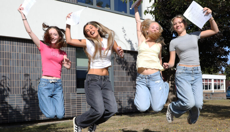 Katie Gazzard, Olivia Breckon, Lois Robinson, Annie Adams celebrating their results Picture: Arnewood School