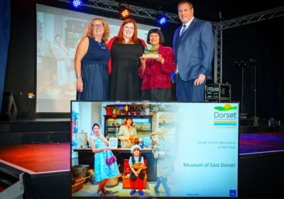 Museum operations manager Andy Putt, trustee Vanessa Joseph and director Francesca Hollow collected the two awards Picture: Museum of East Dorset