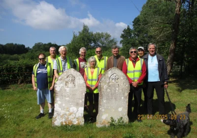 Volunteers with the newly cleaned headstones Picture: John Cullen
