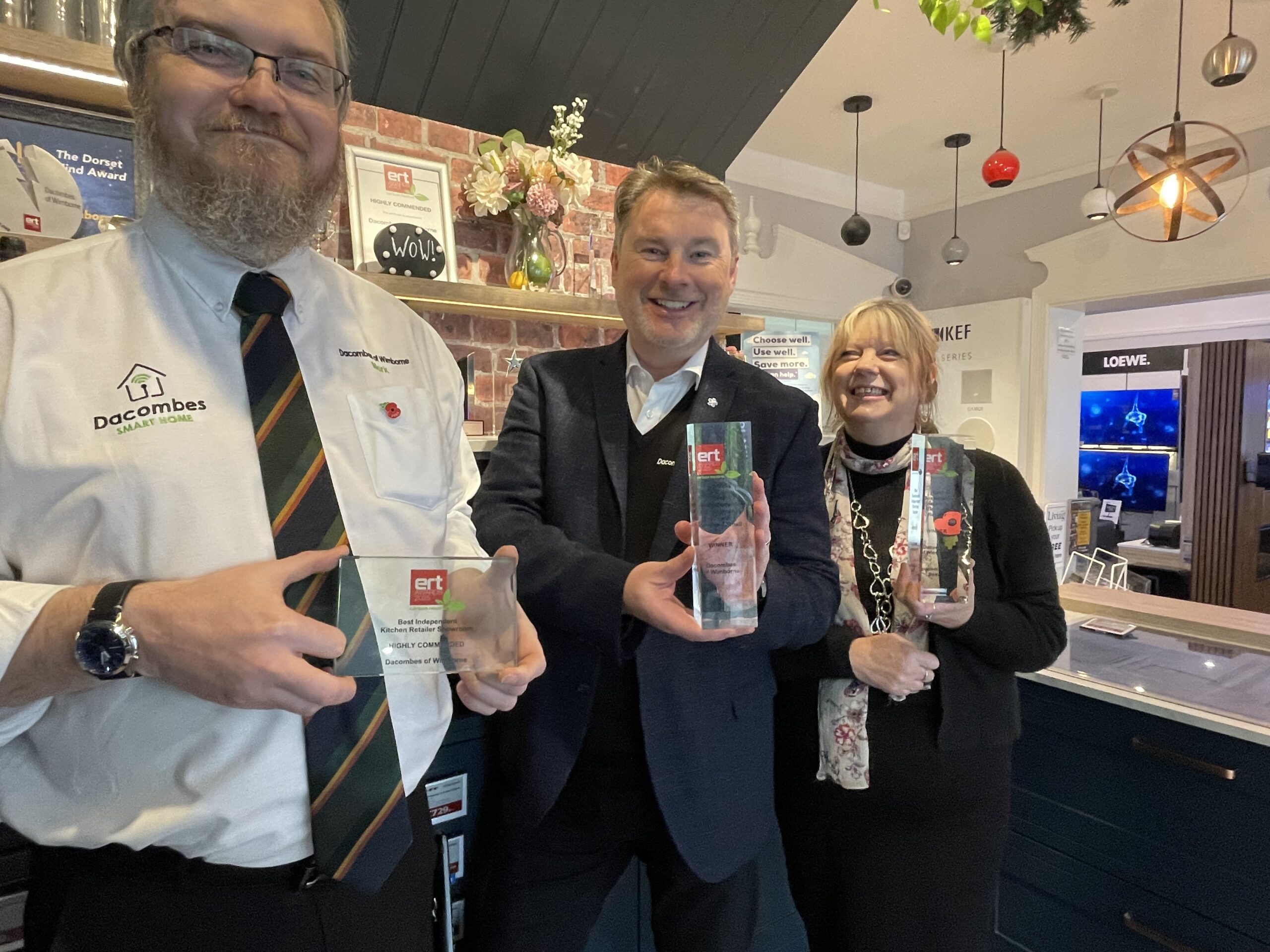 A trio of awards for Dacombes of Wimborne - Mark Winton with Matt Renaut and Helen Potter Picture: Dacombes of Wimborne 