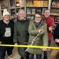 Cutting the ribbon at the new food department at Chestnut Nursery, in Poole