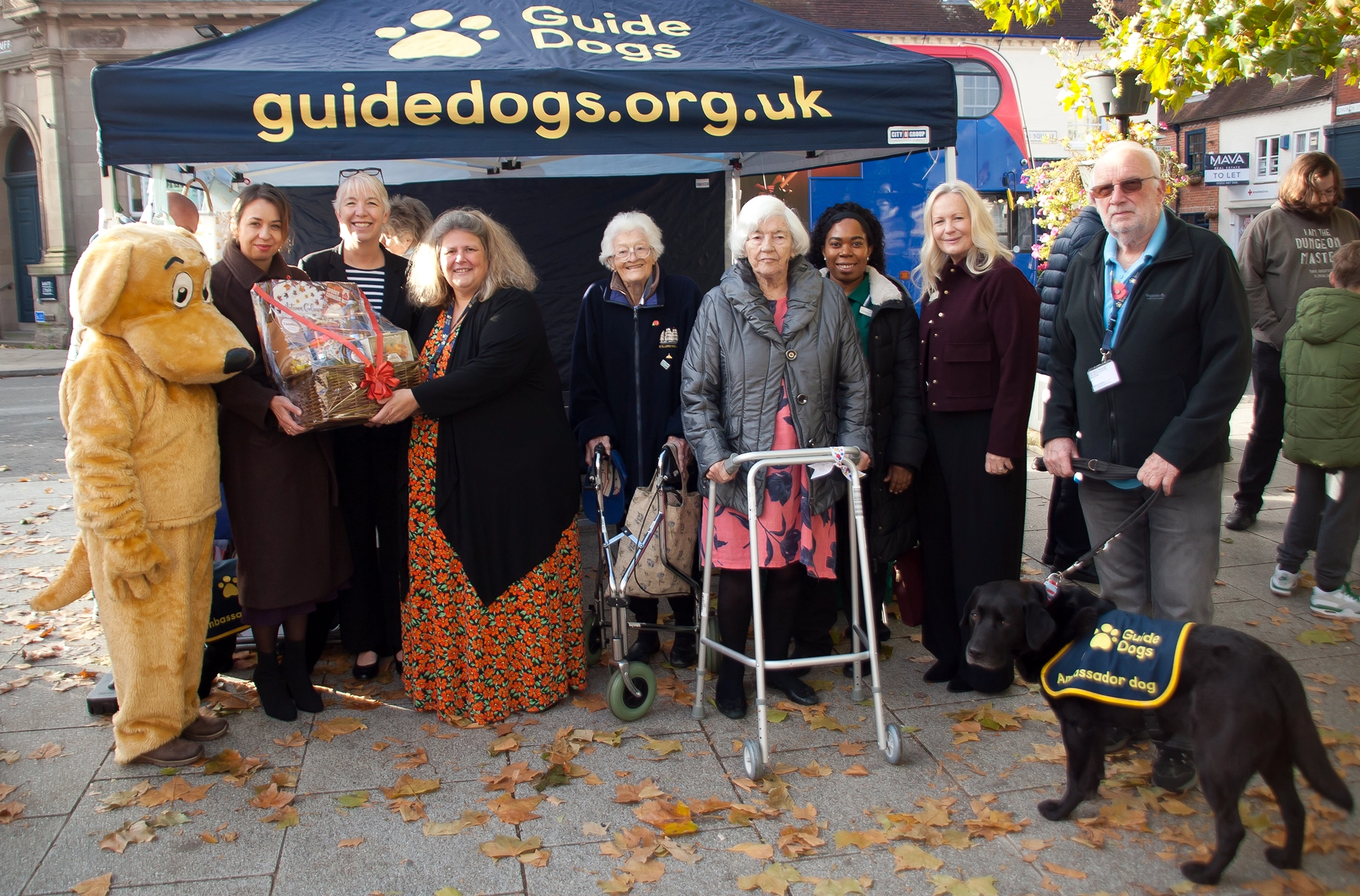 A hamper was presented by Hyacinth House care home