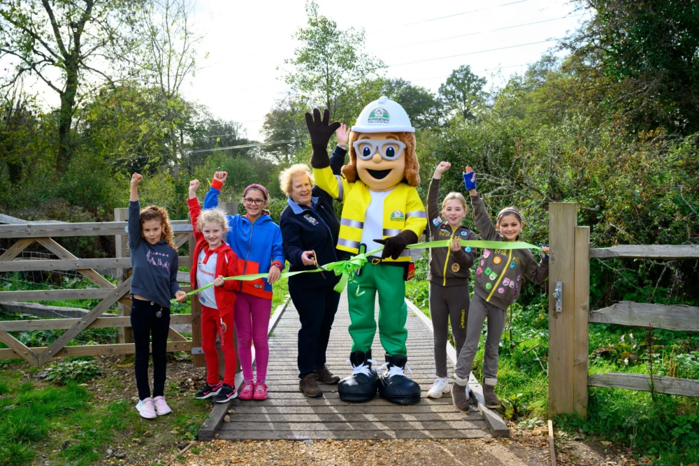 Fordingbridge Girlguiding members joined up with Pennyfarthing Homes to celebrate the opening Picture: Pennyfarthing Homes