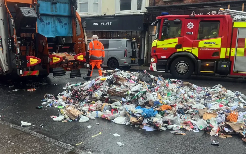 The bin lorry emptied contents in the centre of Wimborne. Pictures: Dorset Council