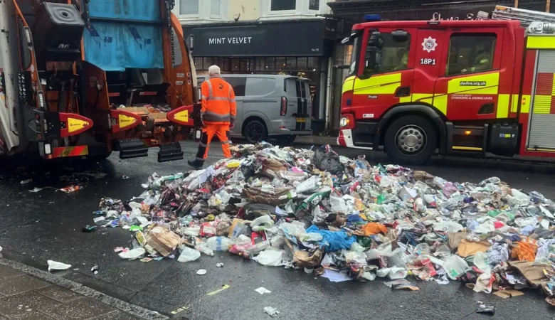The bin lorry emptied contents in the centre of Wimborne. Pictures: Dorset Council