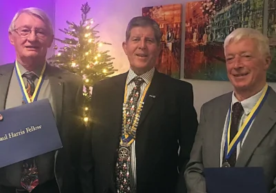 Paul Harris Awards were presented to David Sumner, left, and Chris Mogg, right, by Wimborne Rotary President Brian Dryden, centre