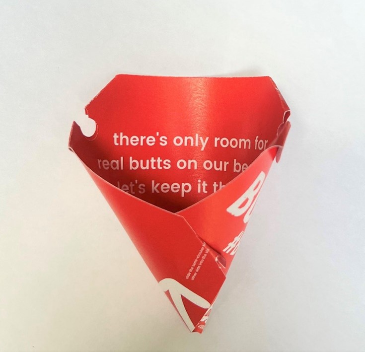 A folded Buttholder handheld ashtray