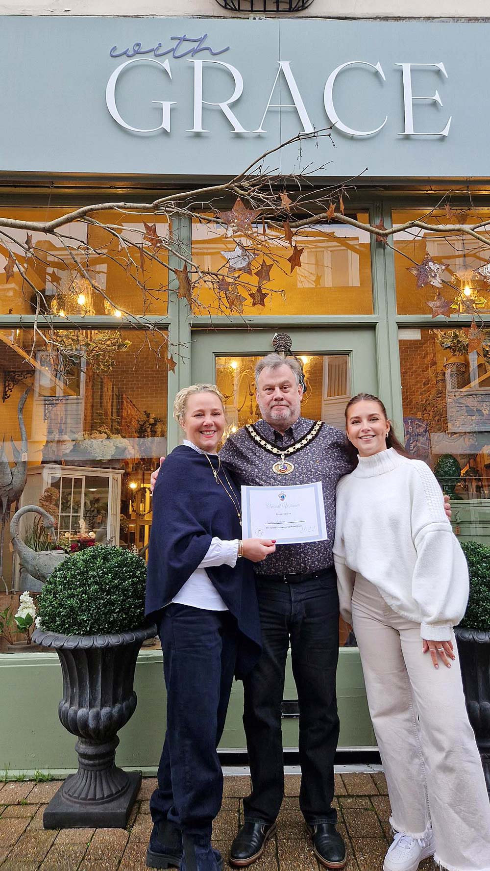 CHRISTMAS CRACKERS: Ringwood mayor Gareth DeBoos with winners With Grace
