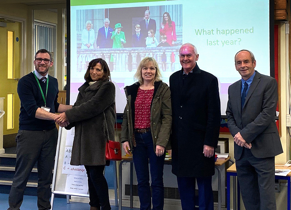 Holt Villagers present St James School with funds for the school’s new library