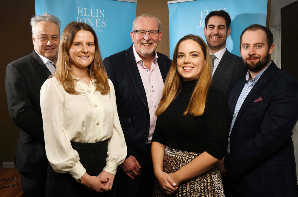 MOVING UP: From left are new partner Andy Kirby, new associate Georgina Emmerson, managing partner Nigel Smith, new associate Tim McMahon and new associate Conor Maher. Not pictured is new senior associate Jennie Hedges