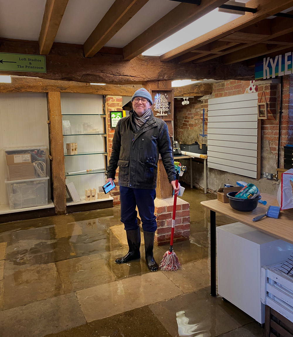 CLEAR UP: Terry Wheeler, above, and John Allen get to work