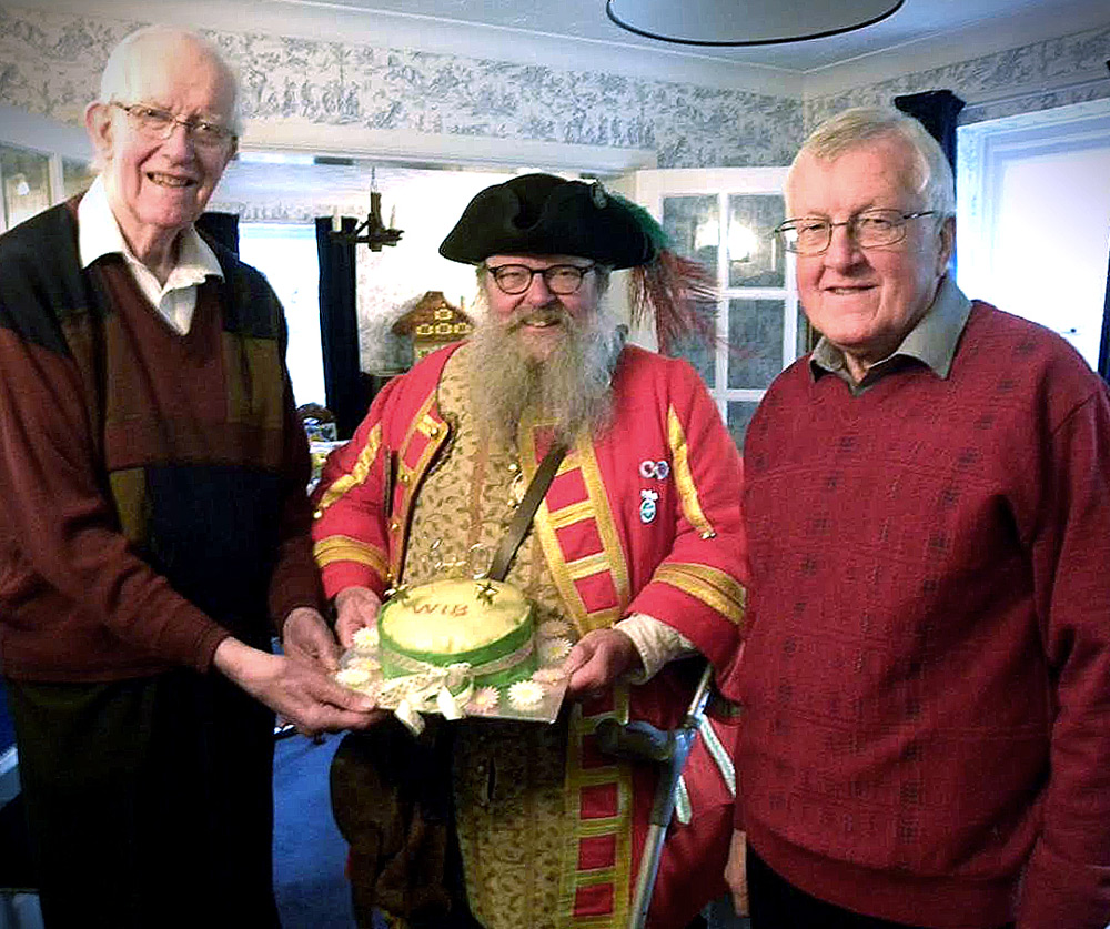 Anthony Oliver founding chairman of Wimborne in Bloom with town crier Chris Brown and Richard Nunn, the current chairman