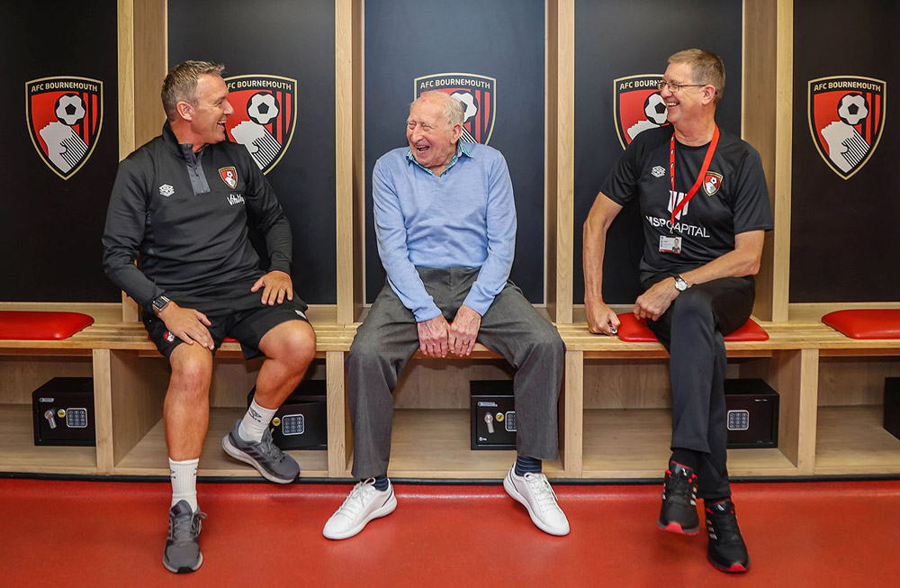 SOCCER STAR: Stan Holland shares a joke with AFCB’s Steve Cuss and Neil Vacher and, below, with Paul Keeping